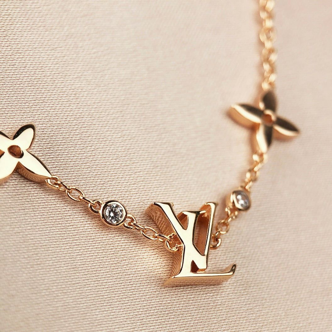 [Loran]STAR AND SUN 7 MOTIFS GOLD BRACELET