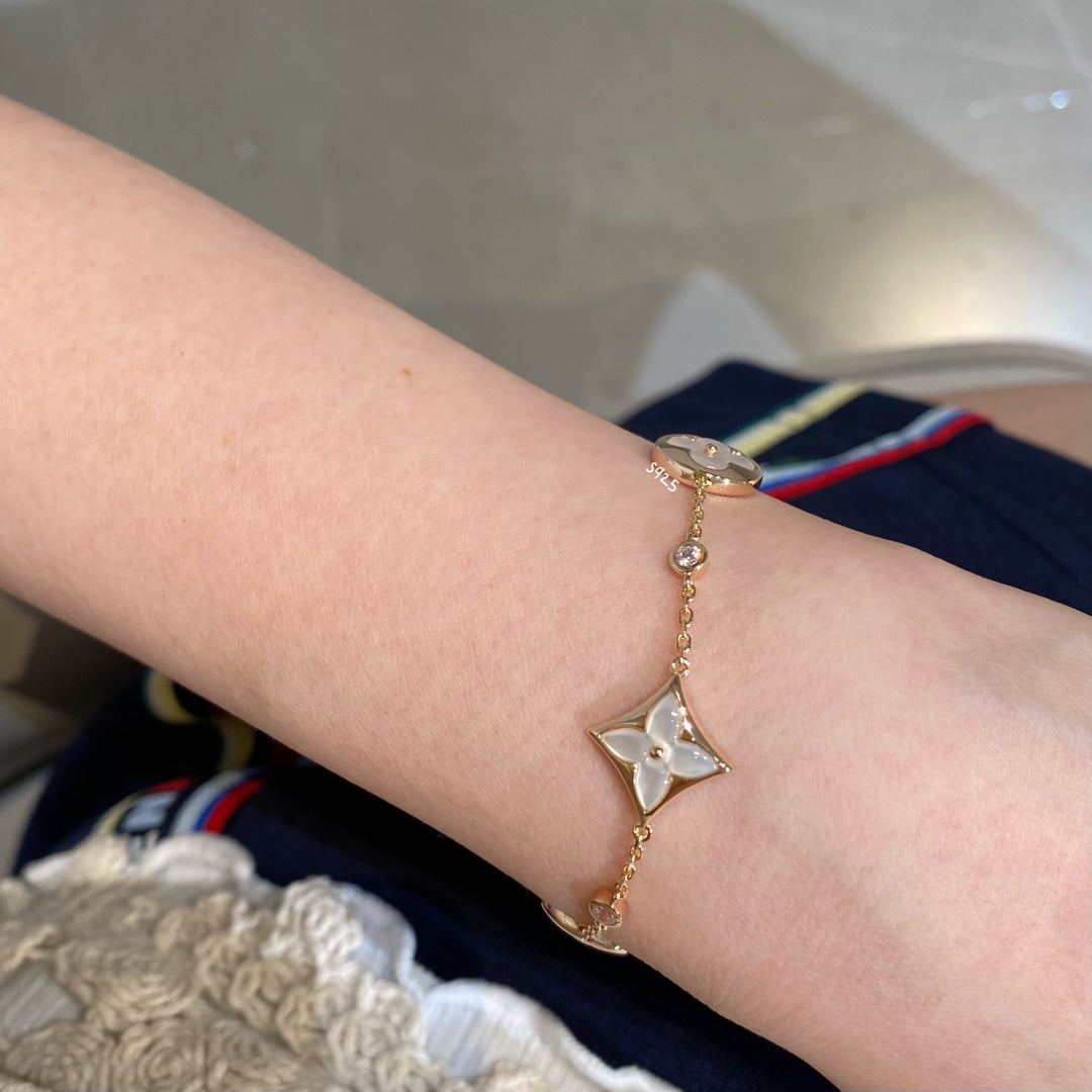 [Loran]STAR AND SUN 4 MOTIF WHITE MOP ROSE GOLD BRACELET